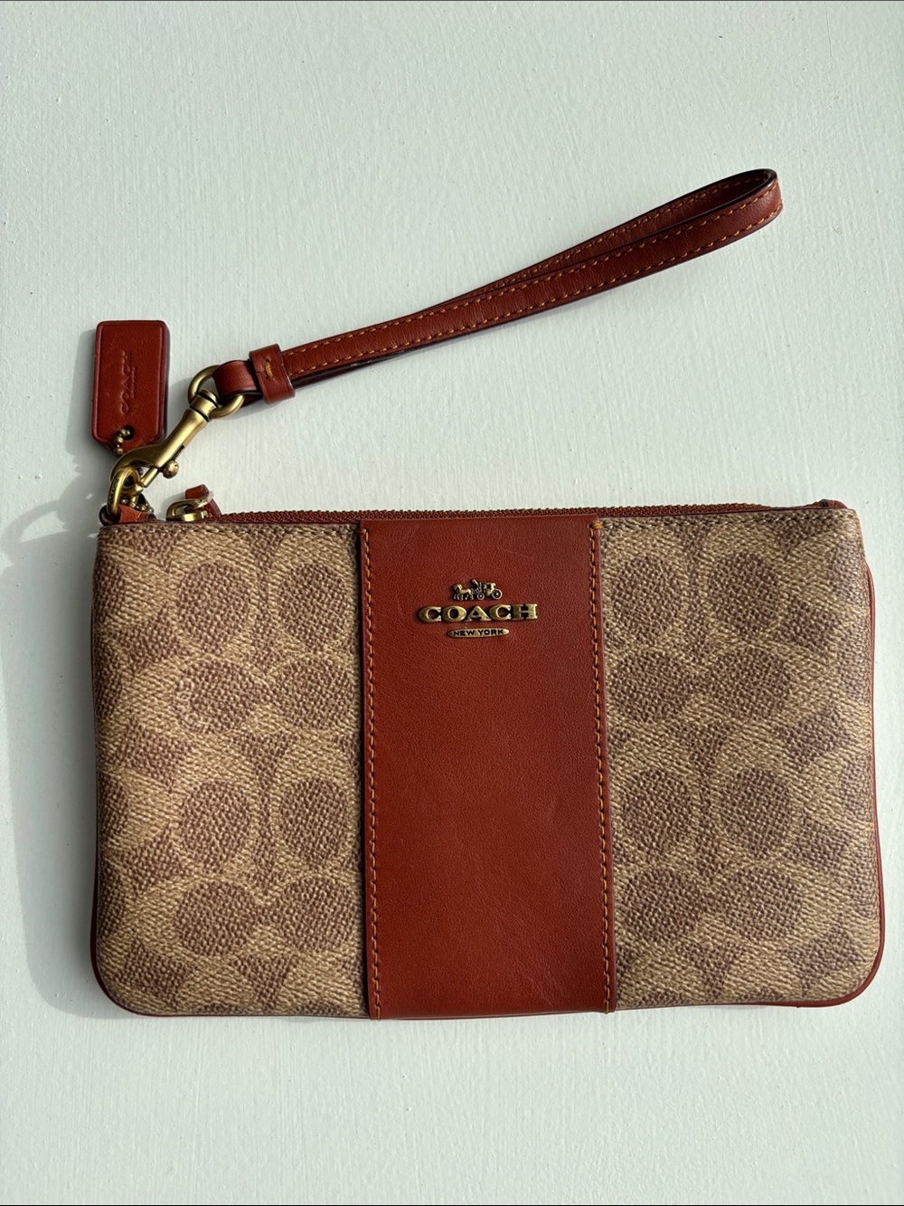 COACH Signature Coated Canvas Tan Rust Colorblock Zip Top Small Wristlet EUC